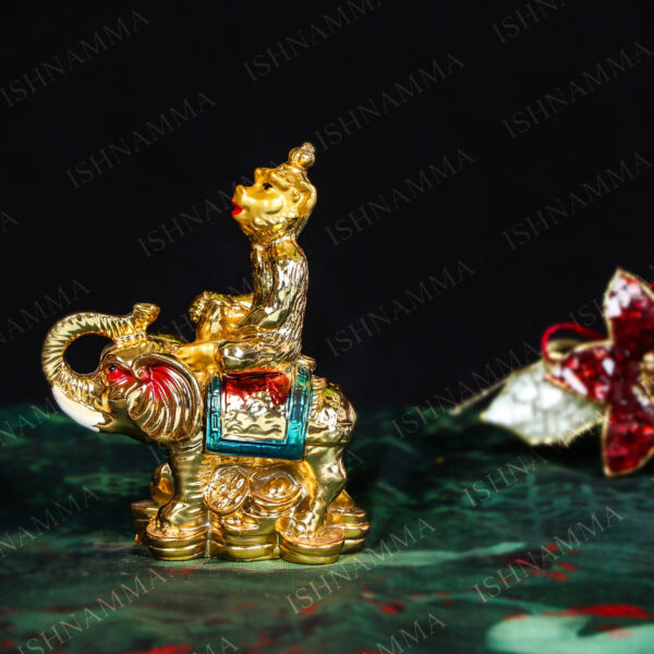 MONKEY ON ELEPHANT WITH GOLD COIN
